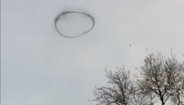 Black Smoke Ring In Sky