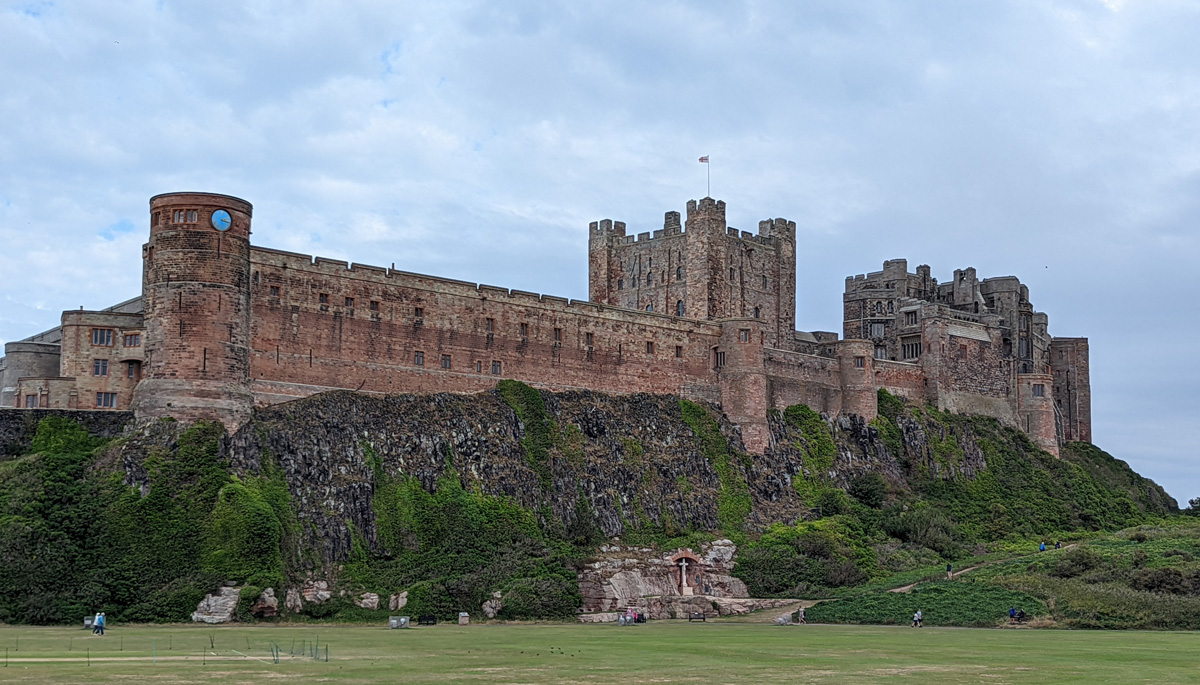 Bamburgh Castle perched on a hill on the Northumberland coast